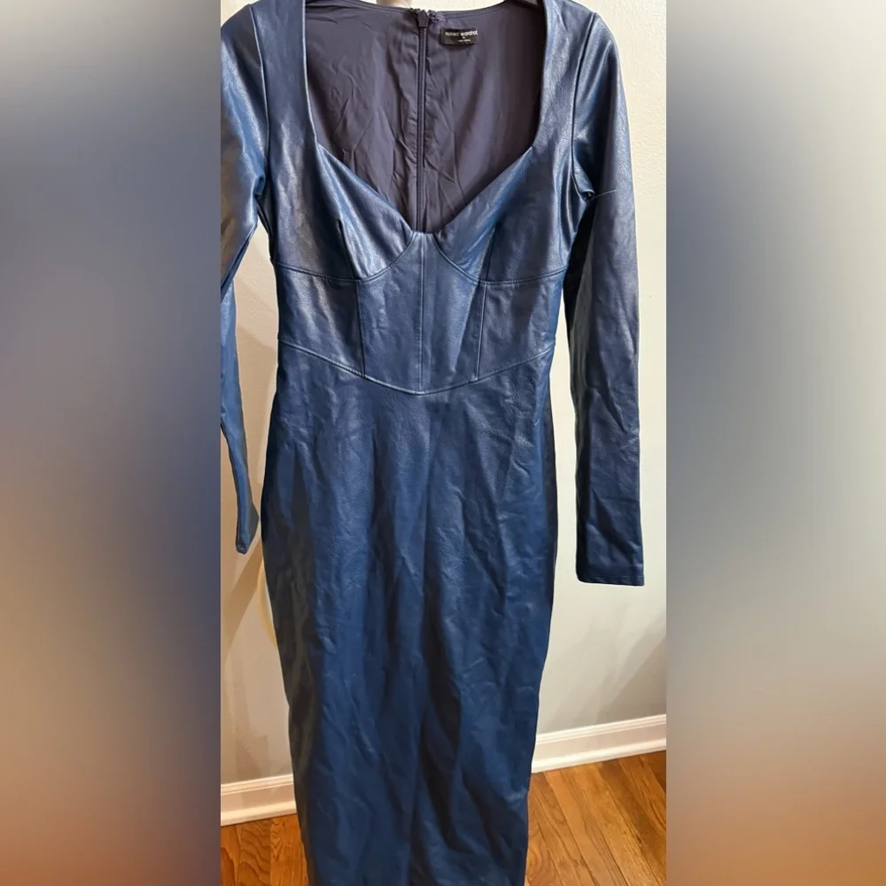Naked wardrobe Dresses
Down to the Corset Long Sleeve Faux Leather Dress - Picture 2 of 4